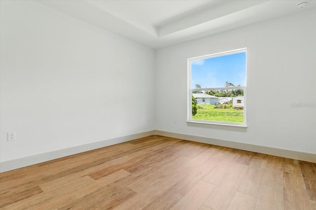 2692 Pretzel Ln, North Port, FL 34286 - spare room featuring light wood-type flooring and baseboards