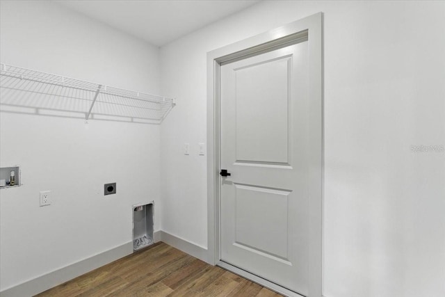2692 Pretzel Ln, North Port, FL 34286 - washroom with hookup for an electric dryer, washer hookup, and wood finished floors