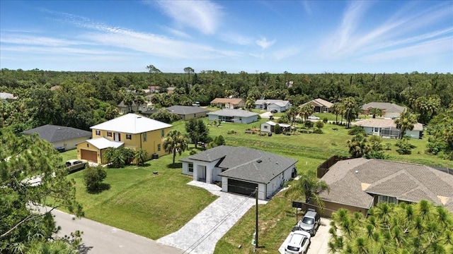 2692 Pretzel Ln, North Port, FL 34286 - aerial perspective of suburban area featuring a forest