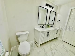 5009 Jody Ave, North Port, FL 34288 - full bath featuring marble look tiles and double vanity
