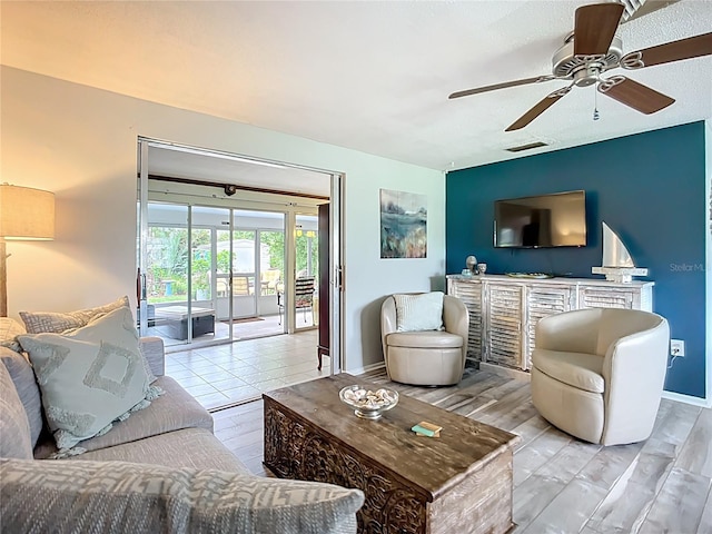 408 67th Ave W, Bradenton, FL 34207 - living area with a ceiling fan and light wood finished floors