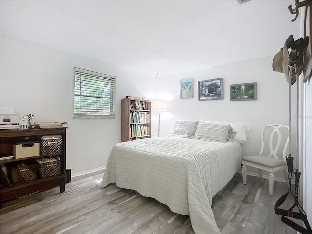 408 67th Ave W, Bradenton, FL 34207 - bedroom featuring wood finished floors and baseboards