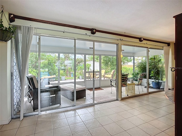 408 67th Ave W, Bradenton, FL 34207 - entryway with light tile patterned floors