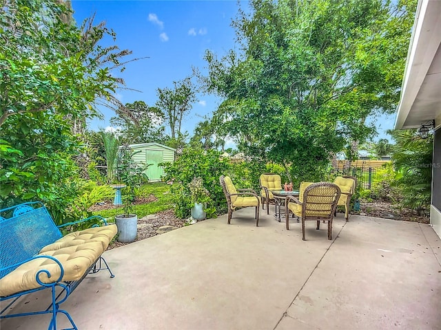 408 67th Ave W, Bradenton, FL 34207 - fenced backyard with a patio and a shed