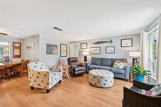 6002 34th Ave W, Bradenton, FL 34209 - living room featuring light wood-style flooring
