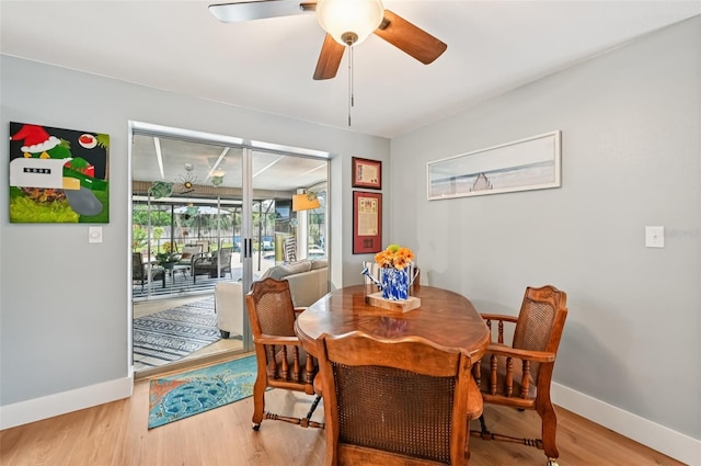 6002 34th Ave W, Bradenton, FL 34209 - dining space with wood finished floors and a ceiling fan