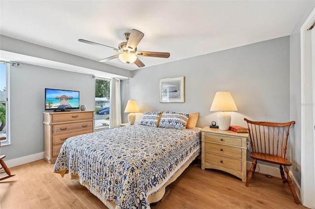 6002 34th Ave W, Bradenton, FL 34209 - bedroom with light wood-style floors and a ceiling fan