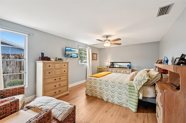 6002 34th Ave W, Bradenton, FL 34209 - bedroom featuring light wood-type flooring and a ceiling fan