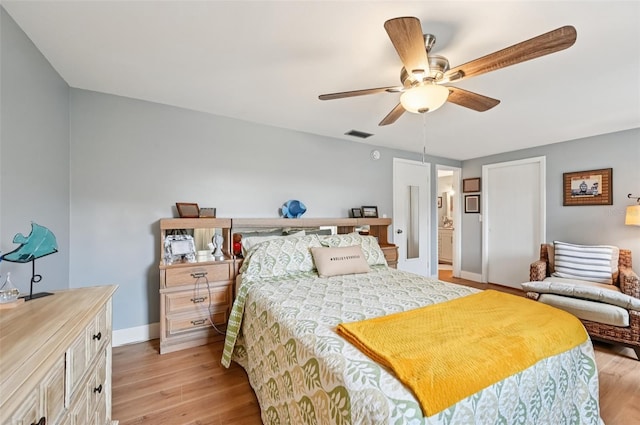 6002 34th Ave W, Bradenton, FL 34209 - bedroom with light wood-type flooring and ceiling fan