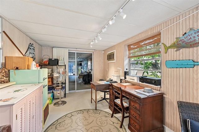6002 34th Ave W, Bradenton, FL 34209 - home office featuring track lighting, wood walls, and a wall mounted air conditioner