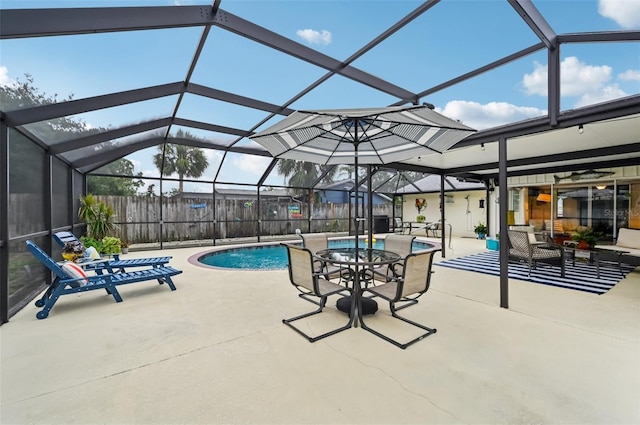6002 34th Ave W, Bradenton, FL 34209 - view of swimming pool featuring a patio, glass enclosure, and a ceiling fan