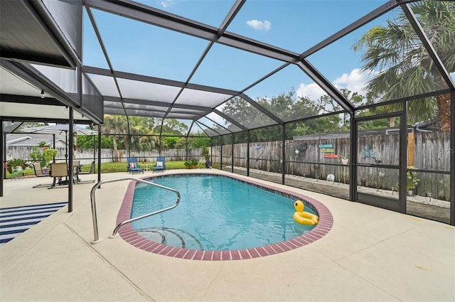 6002 34th Ave W, Bradenton, FL 34209 - view of pool with a fenced backyard, a patio, and a lanai
