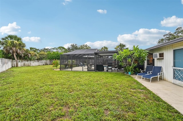 6002 34th Ave W, Bradenton, FL 34209 - fenced backyard with a patio, a wall mounted AC, and glass enclosure