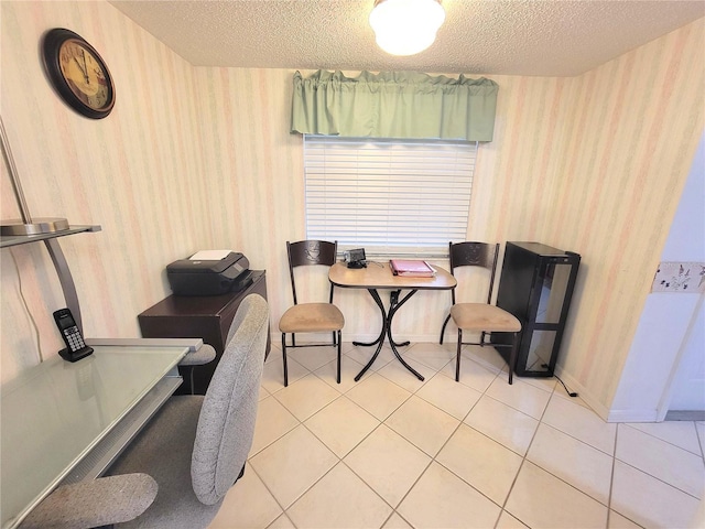 6507 Stone River Rd Unit 302, Bradenton, FL 34203 - office area featuring wallpapered walls, a textured ceiling, and light tile patterned floors