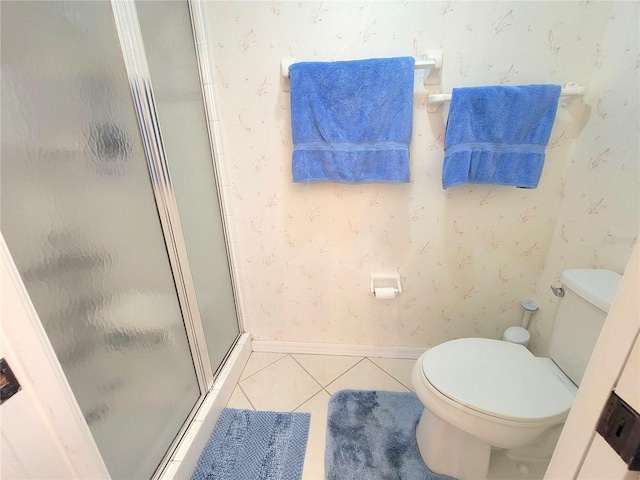 6507 Stone River Rd Unit 302, Bradenton, FL 34203 - full bath featuring tile patterned flooring, a shower stall, and wallpapered walls