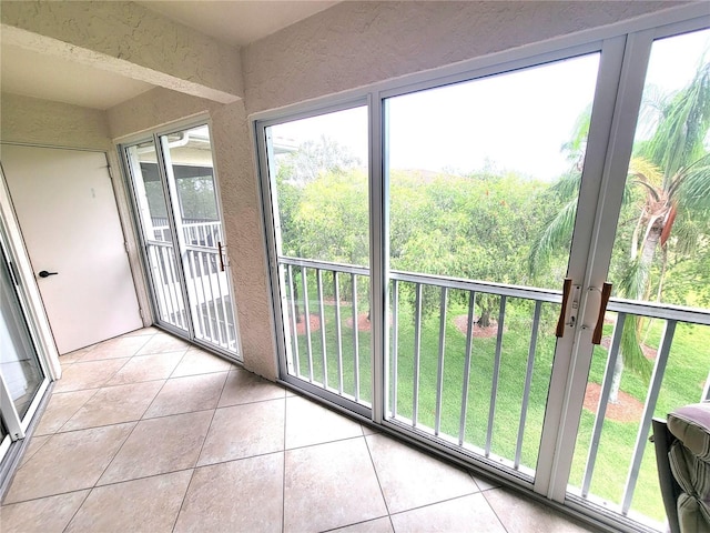 6507 Stone River Rd Unit 302, Bradenton, FL 34203 - unfurnished sunroom with plenty of natural light