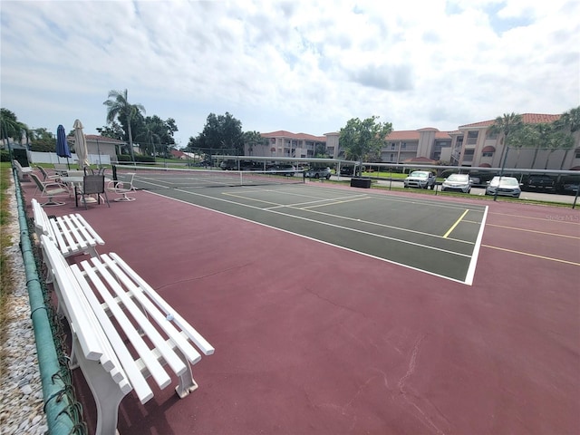 6507 Stone River Rd Unit 302, Bradenton, FL 34203 - view of tennis court featuring community basketball court