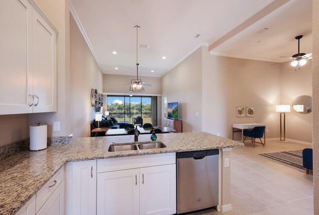 13714 Messina Loop Unit 202, Bradenton, FL 34211 - kitchen featuring dishwasher, a peninsula, ornamental molding, white cabinets, and open floor plan
