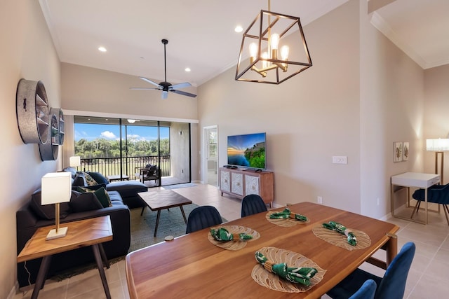13714 Messina Loop Unit 202, Bradenton, FL 34211 - dining area with tile patterned floors, crown molding, a ceiling fan, recessed lighting, and a towering ceiling