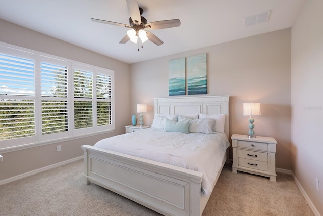 13714 Messina Loop Unit 202, Bradenton, FL 34211 - bedroom featuring light carpet and a ceiling fan