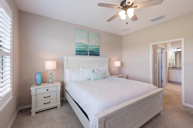 13714 Messina Loop Unit 202, Bradenton, FL 34211 - bedroom featuring light carpet and ceiling fan