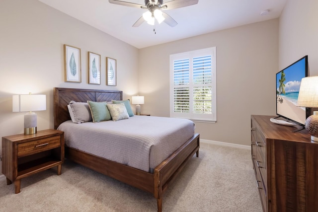 13714 Messina Loop Unit 202, Bradenton, FL 34211 - bedroom with light colored carpet and a ceiling fan