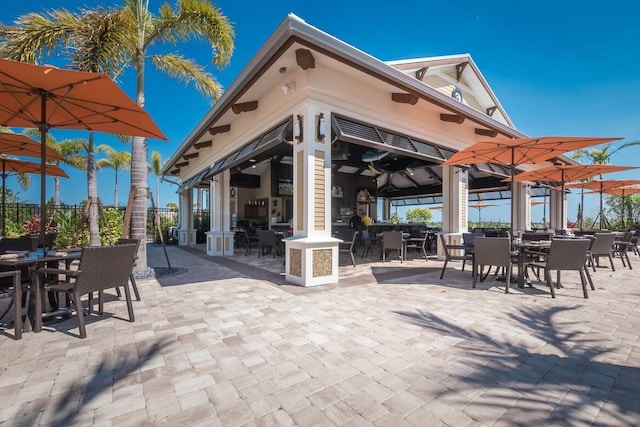 13714 Messina Loop Unit 202, Bradenton, FL 34211 - view of patio featuring outdoor dining space