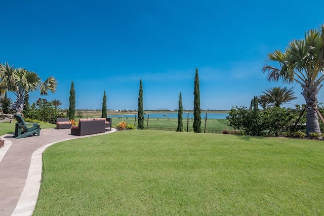 13714 Messina Loop Unit 202, Bradenton, FL 34211 - view of home's community with a water view and outdoor lounge area