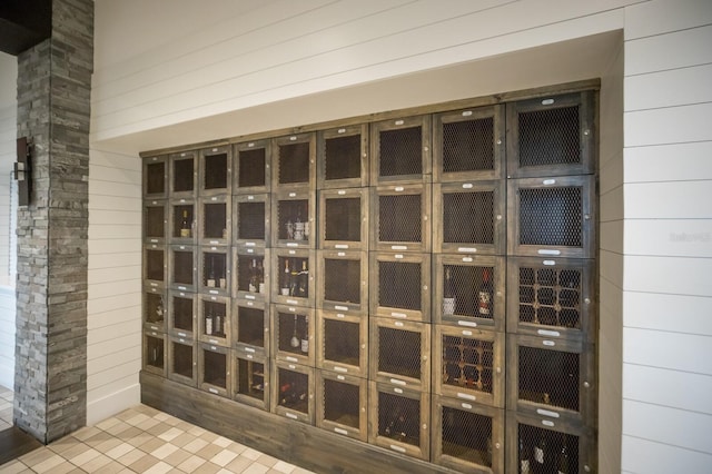 13714 Messina Loop Unit 202, Bradenton, FL 34211 - wine room featuring wooden walls