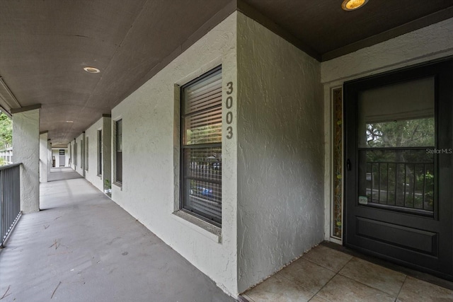 3003 Quail Holw Unit 10, Sarasota, FL 34235 - property entrance with stucco siding