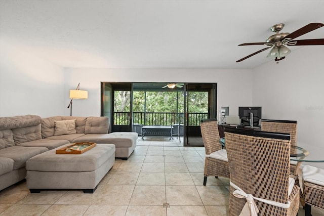 3003 Quail Holw Unit 10, Sarasota, FL 34235 - living room with a ceiling fan and light tile patterned floors
