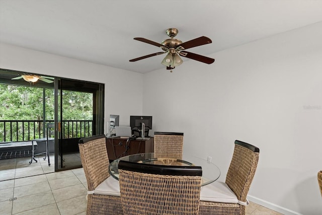 3003 Quail Holw Unit 10, Sarasota, FL 34235 - dining space with ceiling fan, light tile patterned flooring, and a desk