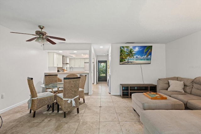 3003 Quail Holw Unit 10, Sarasota, FL 34235 - living area with ceiling fan, light tile patterned flooring, and recessed lighting