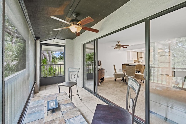 3003 Quail Holw Unit 10, Sarasota, FL 34235 - sunroom / solarium featuring a ceiling fan and vaulted ceiling