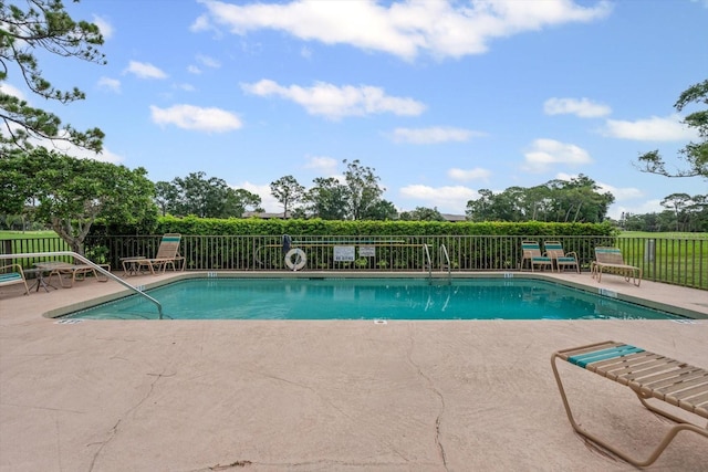 3003 Quail Holw Unit 10, Sarasota, FL 34235 - community pool featuring a patio area
