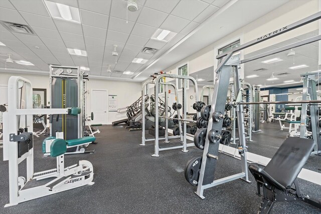 3003 Quail Holw Unit 10, Sarasota, FL 34235 - workout area with a paneled ceiling