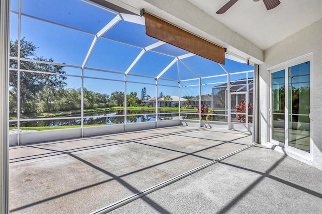 7005 Goldrush Ln, Bradenton, FL 34201 - unfurnished sunroom featuring a ceiling fan, a water view, and vaulted ceiling