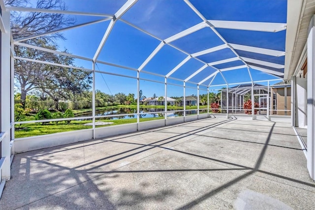 7005 Goldrush Ln, Bradenton, FL 34201 - view of patio featuring a water view and glass enclosure