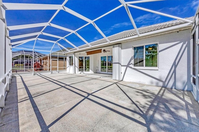 7005 Goldrush Ln, Bradenton, FL 34201 - rear view of house featuring a patio, a tiled roof, a ceiling fan, and a lanai