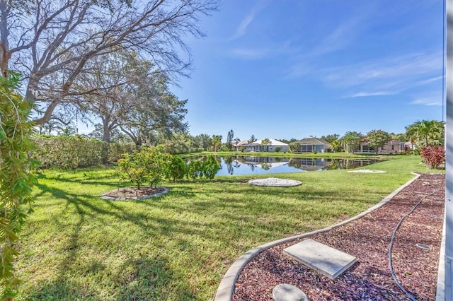 7005 Goldrush Ln, Bradenton, FL 34201 - view of green lawn with a water view