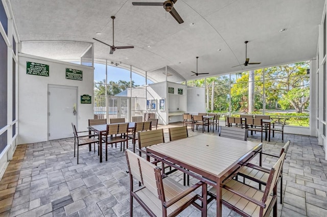 7005 Goldrush Ln, Bradenton, FL 34201 - sunroom / solarium featuring outdoor dining space, ceiling fan, and vaulted ceiling