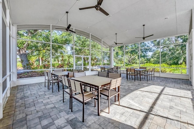 7005 Goldrush Ln, Bradenton, FL 34201 - view of patio / terrace featuring outdoor dining space, ceiling fan, and view of wooded area