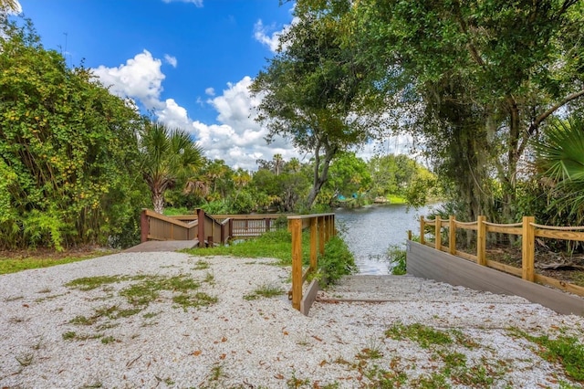 7005 Goldrush Ln, Bradenton, FL 34201 - view of yard with a water view and view of wooded area