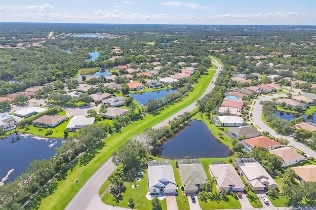 7005 Goldrush Ln, Bradenton, FL 34201 - aerial view of property and surrounding area featuring nearby suburban area and a large body of water