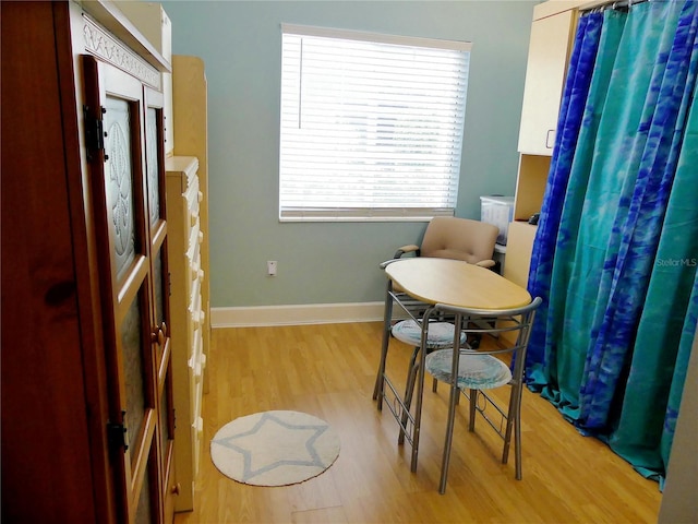 1850 Sunny Dr Unit F4, Bradenton, FL 34207 - dining space with wood finished floors and plenty of natural light