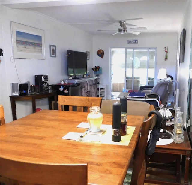 1850 Sunny Dr Unit F4, Bradenton, FL 34207 - dining room featuring ceiling fan and crown molding