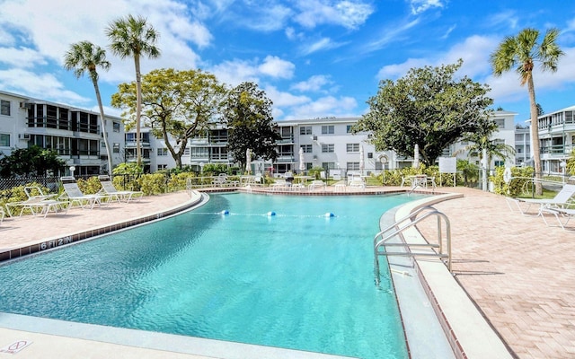 1850 Sunny Dr Unit F4, Bradenton, FL 34207 - community pool featuring a patio area