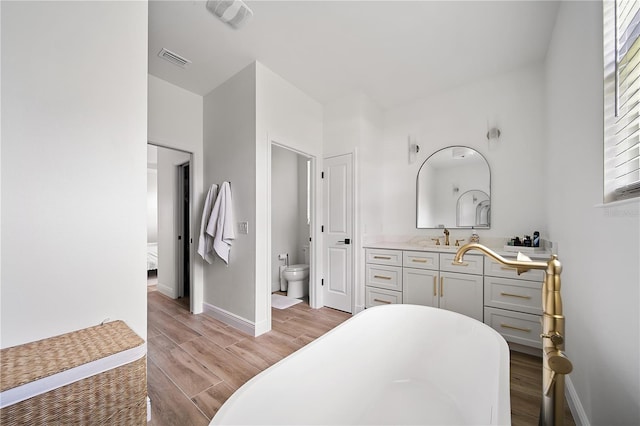 326 Randolph Rd, Venice, FL 34293 - bedroom with light wood-style floors and connected bathroom