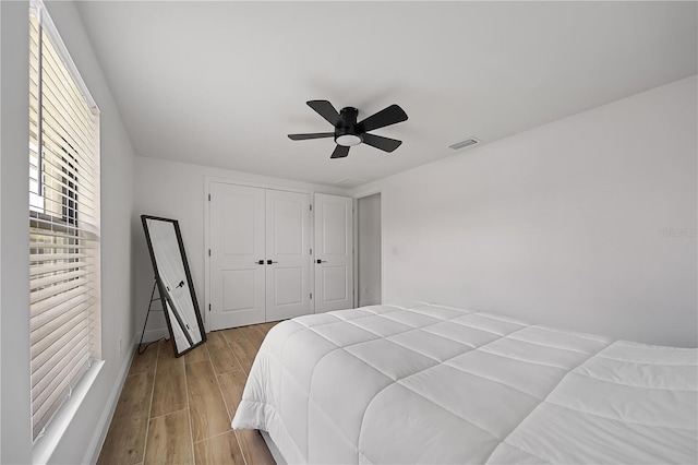 326 Randolph Rd, Venice, FL 34293 - bedroom featuring wood finished floors, a ceiling fan, and a closet