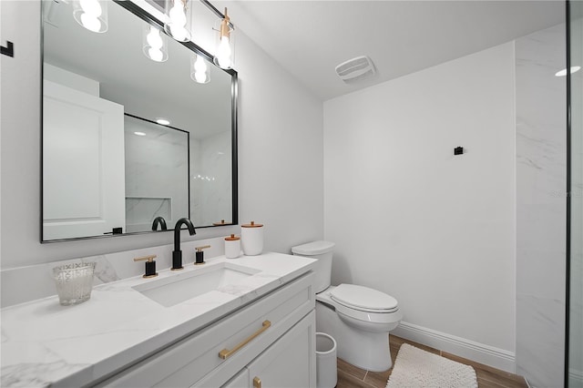 326 Randolph Rd, Venice, FL 34293 - full bathroom with vanity, wood finished floors, and a marble finish shower